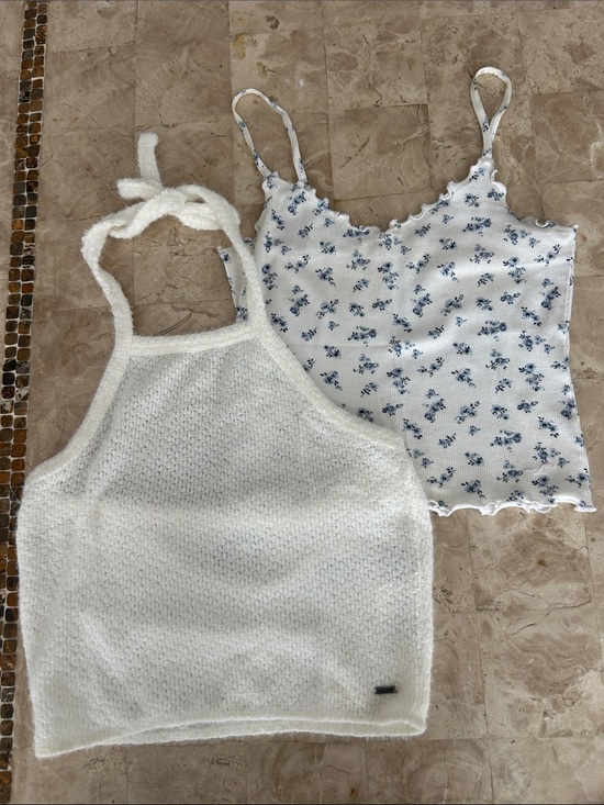 Hollister Other - Lot of 2 Hollister Tops 1 Floral Tank Top Size S
White Halter Top Size M Juniors